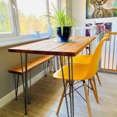 Light teak dining hairpin table yellow chairs raw steel